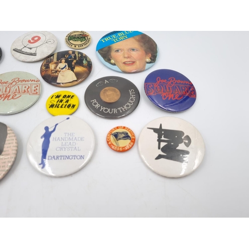 120B - A collection of assorted vintage pin badges to include 