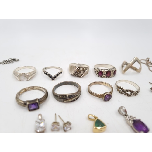 23 - A collection of 925 silver jewellery to include nine various rings, earrings, pendants etc. - approx... 