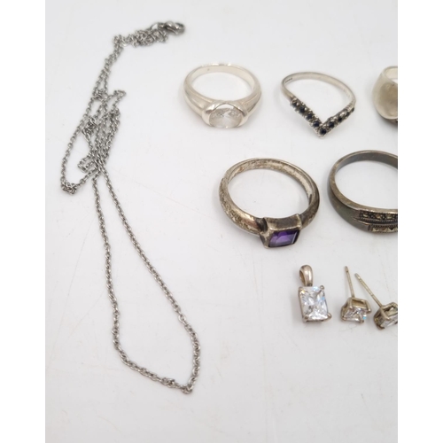 23 - A collection of 925 silver jewellery to include nine various rings, earrings, pendants etc. - approx... 