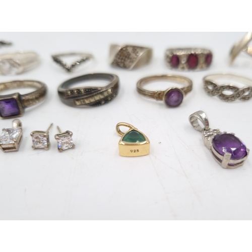 23 - A collection of 925 silver jewellery to include nine various rings, earrings, pendants etc. - approx... 