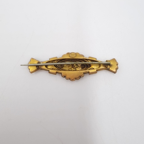 26 - A late 19th/early 20th century 9ct gold seed pearl and red gemstone bar brooch - approx. 4.5cm wide ... 