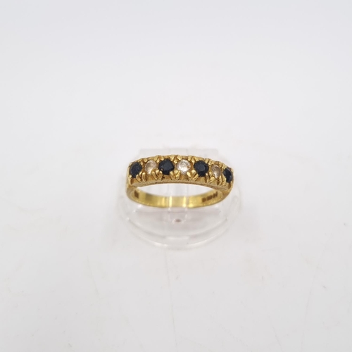 29 - A hallmarked London 18ct gold sapphire and diamond ring, size N - approx. gross weight 5.5 grams