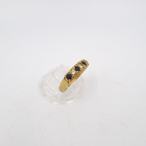 29 - A hallmarked London 18ct gold sapphire and diamond ring, size N - approx. gross weight 5.5 grams