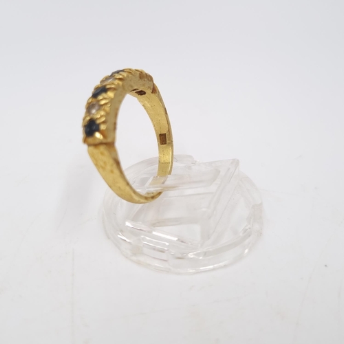 29 - A hallmarked London 18ct gold sapphire and diamond ring, size N - approx. gross weight 5.5 grams