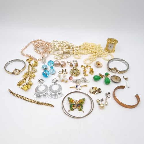 50 - Two boxes containing assorted costume jewellery and curios to include enamelled and jewelled fish pi... 