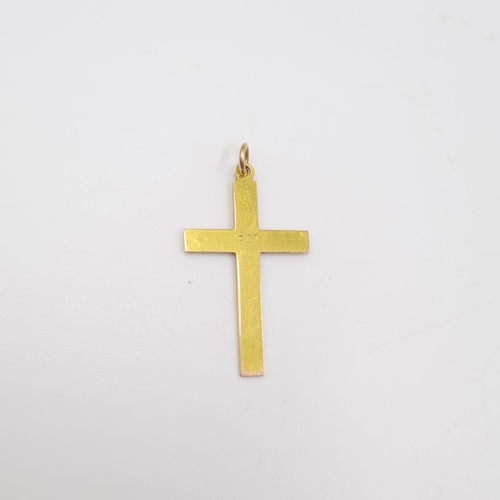 54 - A 9ct gold cross pendant - approx. gross weight 1.1 gram