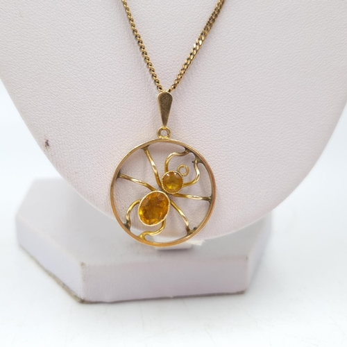 55 - A 9ct gold chain necklace with 9ct gold and citrine spider design pendant - approx. gross weight 6.7... 