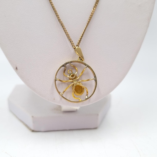 55 - A 9ct gold chain necklace with 9ct gold and citrine spider design pendant - approx. gross weight 6.7... 