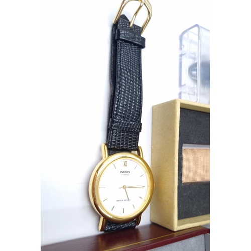 59 - A collection of assorted wristwatches to include boxed Swiss Balance with guarantee card, boxed Cont... 