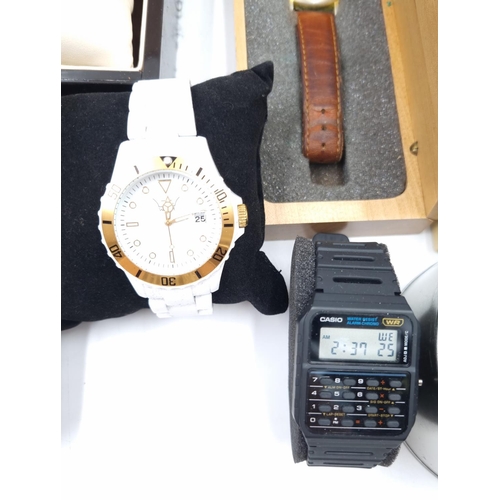 59 - A collection of assorted wristwatches to include boxed Swiss Balance with guarantee card, boxed Cont... 