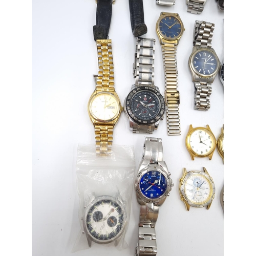 79 - A large collection of assorted men's wristwatches to include Casio quartz, Citizen chronograph alarm... 