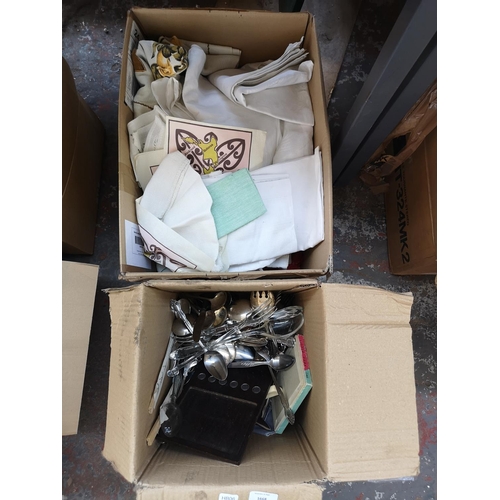 1814 - Two boxes containing assorted items to include vintage linen, cutlery etc.