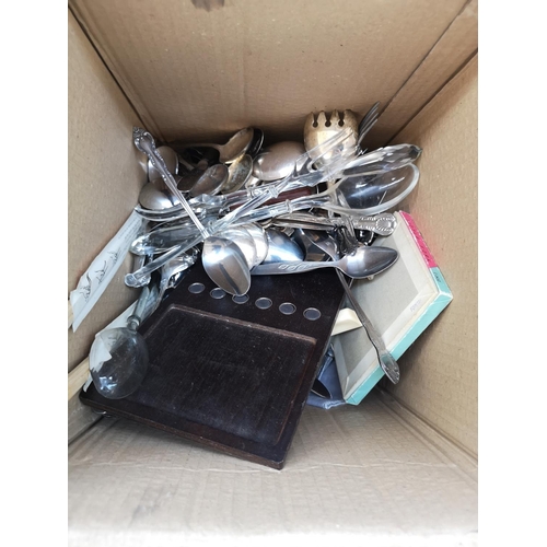 1814 - Two boxes containing assorted items to include vintage linen, cutlery etc.