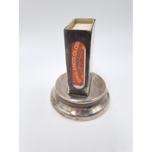 153 - An Edwardian hallmarked Birmingham silver weighted matchbox holder, dated 1910 - approx. 8cm high x ... 