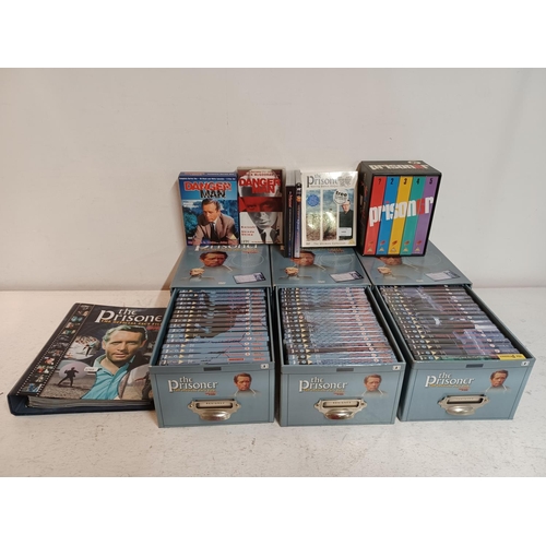 1435 - An extensive collection of The Prisoner and Dangerman items to include DVD boxsets and VHS videos et... 