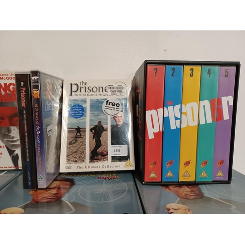 1435 - An extensive collection of The Prisoner and Dangerman items to include DVD boxsets and VHS videos et... 