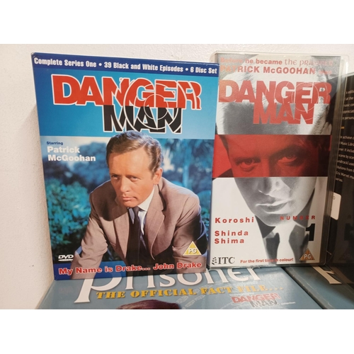 1435 - An extensive collection of The Prisoner and Dangerman items to include DVD boxsets and VHS videos et... 