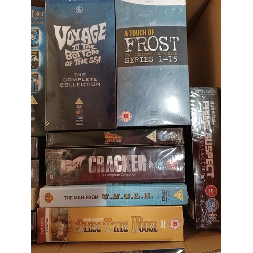 1443 - A box containing sealed DVD boxsets to include A Touch of Frost series 1-15, Voyage to the Bottom of... 