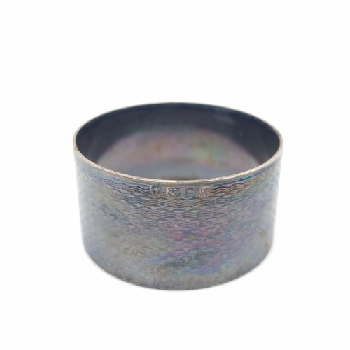 158 - Two pieces of hallmarked silver, one Birmingham napkin ring, dated 1933 - approx. gross weight 20g a... 