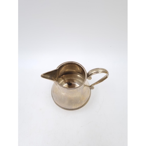 161 - An antique hallmarked Birmingham sterling silver cream jug - approx. gross weight 88g