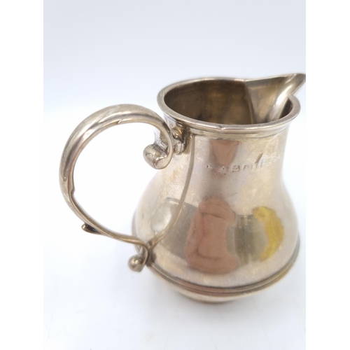 161 - An antique hallmarked Birmingham sterling silver cream jug - approx. gross weight 88g