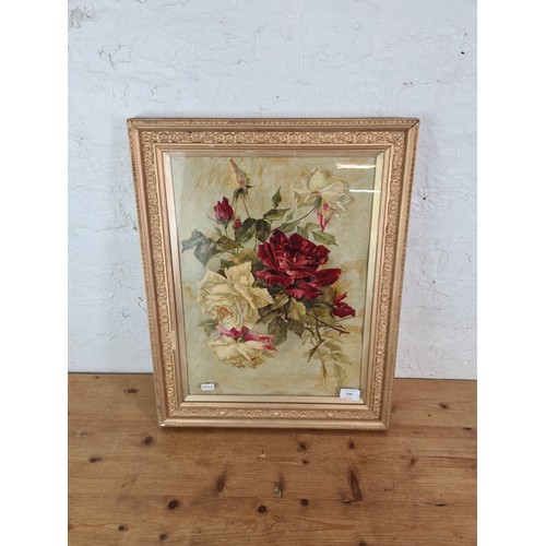 1289 - A gilt framed floral oil painting - approx. 59cm high x 47cm wide