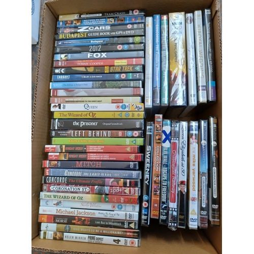 1445 - A box containing sealed DVDs to include Z Cars, The Wizard of Oz, Chitty Chitty Bang Bang, Shirley V... 