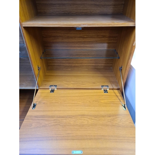 19 - A mid 20th century teak display cabinet - approx. 150cm high x 106cm wide x 30cm deep