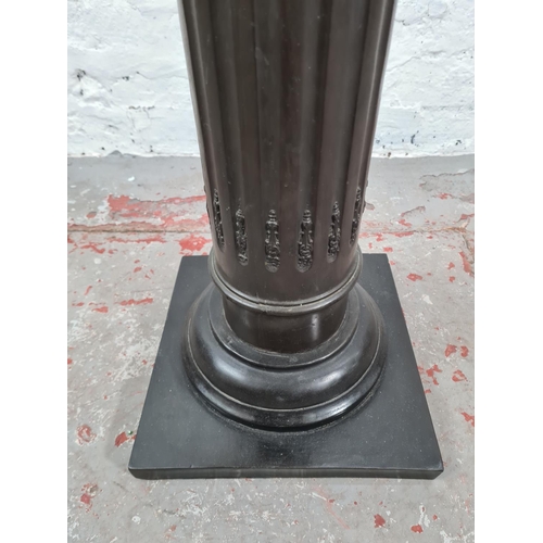 45 - A bronze effect Corinthian column jardinière stand - approx. 104cm high