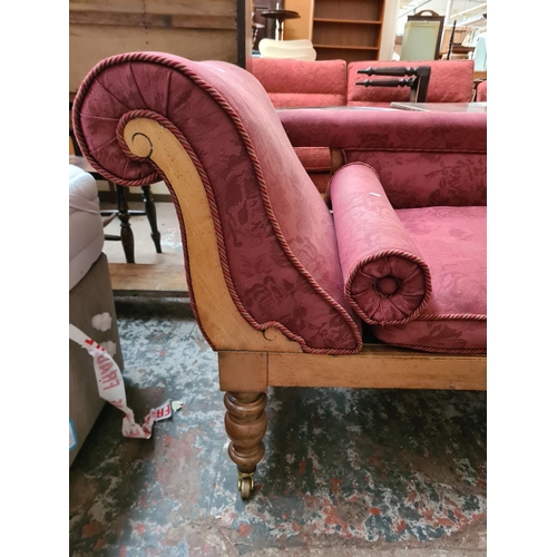 183 - An Edwardian style beech and red upholstered chaise longue