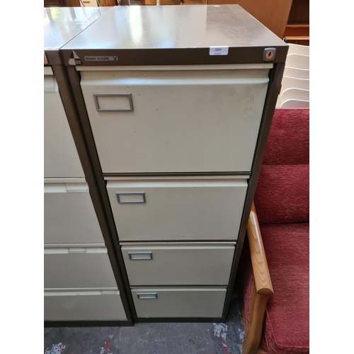 185 - A Roneo Vickers brown and cream metal four drawer office filing cabinet - approx. 132cm high x 48cm ... 