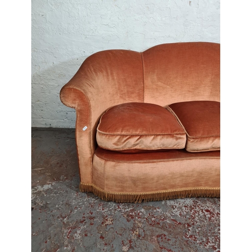 190 - A mid 20th century Victorian style orange upholstered three seater sofa - approx. 86cm high x 176cm ... 