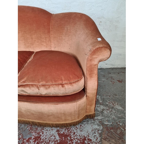 190 - A mid 20th century Victorian style orange upholstered three seater sofa - approx. 86cm high x 176cm ... 