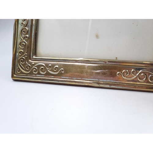 1062 - A pair of Francis Howard Ltd hallmarked Sheffield silver photo frames - approx. 22.5cm high x 17.5cm... 