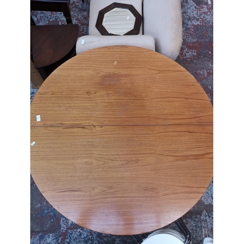 217 - Five pieces of furniture, one teak circular extending dining table, one mahogany bowfront corner cab... 