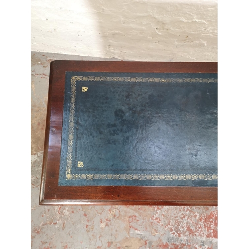 219 - A 19th century mahogany two drawer writing table with blue leather insert - approx. 75cm high x 90cm... 