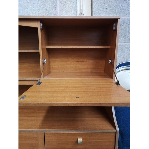 228 - A Schreiber teak effect highboard - approx. 131cm high x 134cm wide x 40cm deep