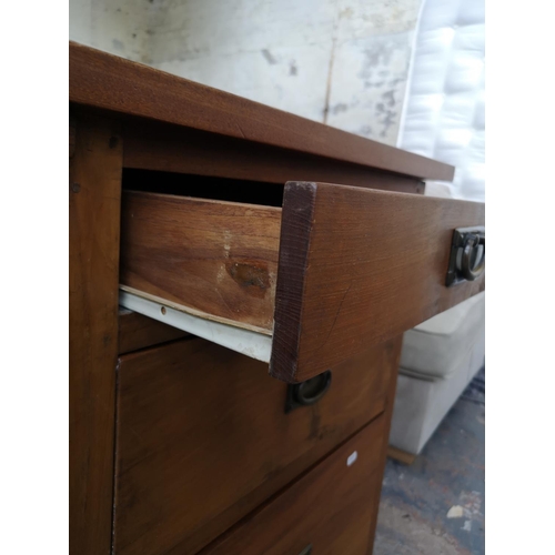 233 - An Indonesian solid teak office desk with three drawers and removable keyboard tray - approx. 69.5cm... 