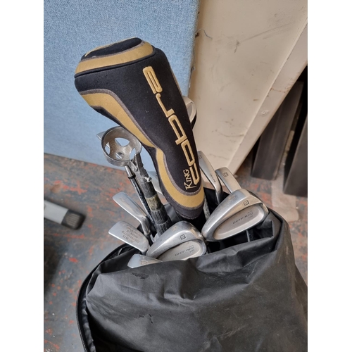 478 - A Wilson golf bag containing assorted golf clubs to include Prostaff, Wilson etc.