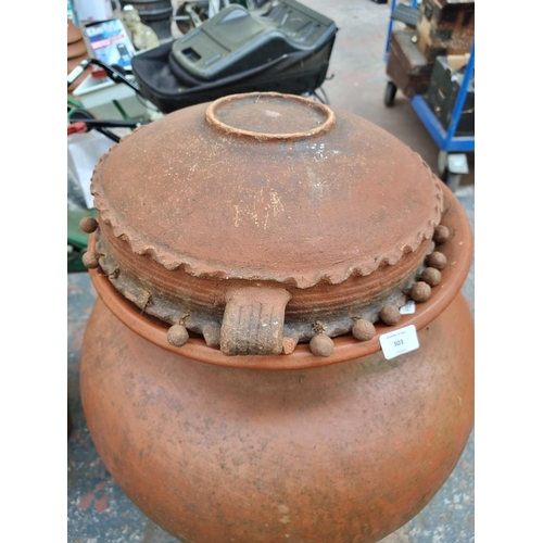 503 - A large terracotta effect planter - approx. 80cm high