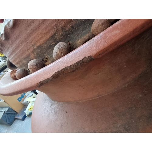 503 - A large terracotta effect planter - approx. 80cm high