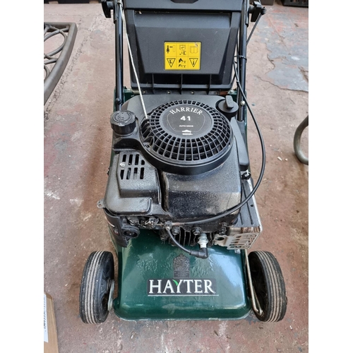 514 - A Hayter Harrier 41 petrol powered lawn mower with grass collector