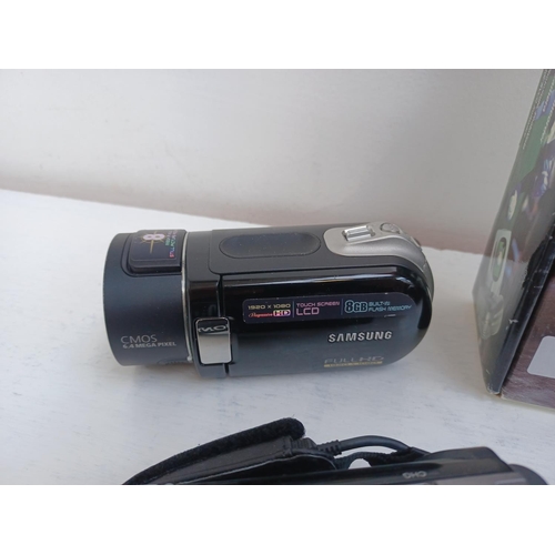 313 - A collection of digital camcorders to include boxed Sony HDR-PJ410 Handycam with accessories, cased ... 