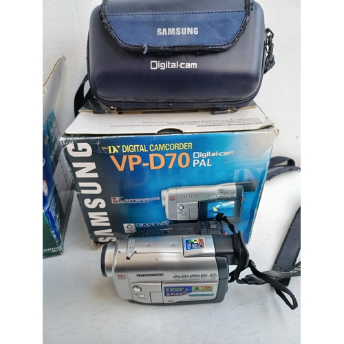 318 - A collection of Mini DV digital camcorders to include JVC GR-DX35EK, boxed Samsung VP-D70, cased Can... 