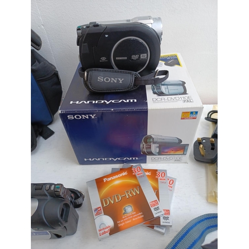 320 - A collection of DVD camcorders to include boxed Sony DCR-DVD110E Handycam, cased Sony DCR-DVD410 wit... 