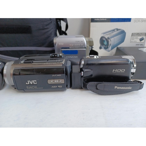 321 - A collection of digital camcorders to include Sony DCR-SR58E 80GB, cased Sony HDR-SR12E 10.2MP 120GB... 