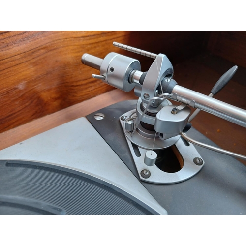 325 - A high quality Thorens TD124/II four speed belt-idler drive turntable fitted with Shure M75E cartrid... 