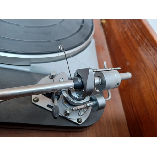 325 - A high quality Thorens TD124/II four speed belt-idler drive turntable fitted with Shure M75E cartrid... 