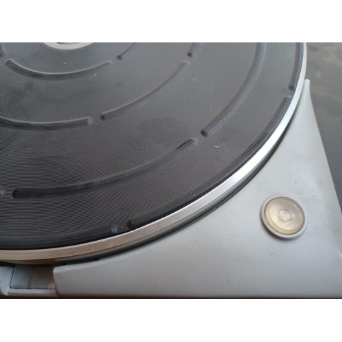 325 - A high quality Thorens TD124/II four speed belt-idler drive turntable fitted with Shure M75E cartrid... 