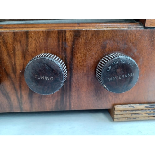 328 - A mid 20th century HMV 1121 valve radio.